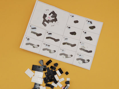 Chat qui se lèche - Kit de construction en briques décoratif (62 pièces)