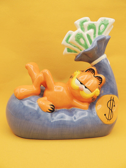 Garfield - Tirelire Sac de Billets - Céramique Tropico Diffusion