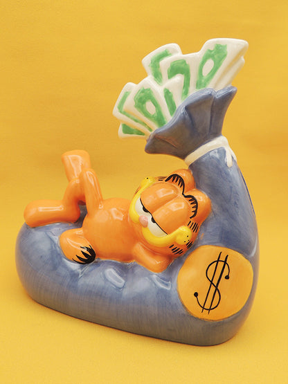 Garfield - Tirelire Sac de Billets - Céramique Tropico Diffusion